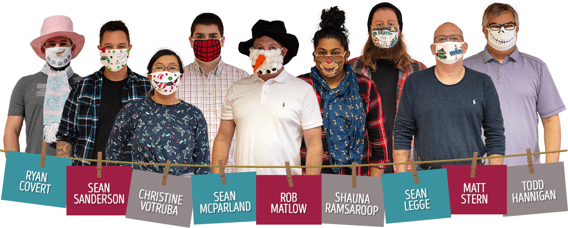 REM Team wearing their holiday face masks